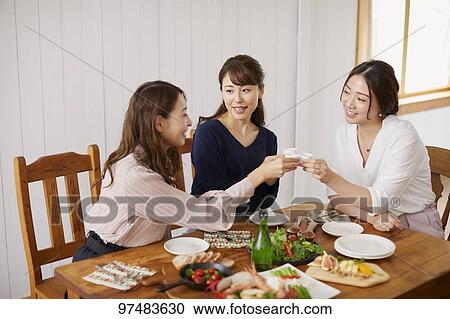 Japanese women having home party View Large Photo Image Stock Image - Japanese women having home party. Fotosearch