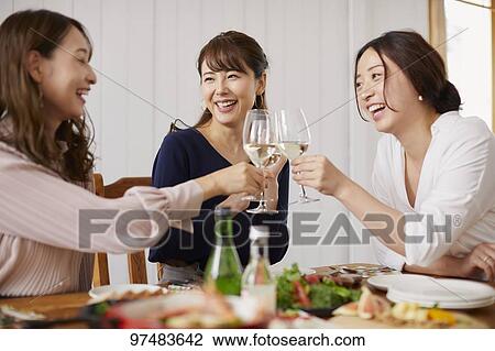 Japanese women having home party View Large Photo Image Stock Image - Japanese women having home party. Fotosearch