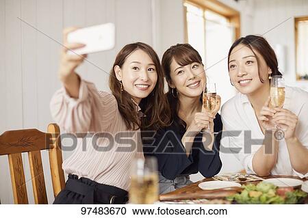 Japanese women having home party View Large Photo Image Stock Image - Japanese women having home party. Fotosearch