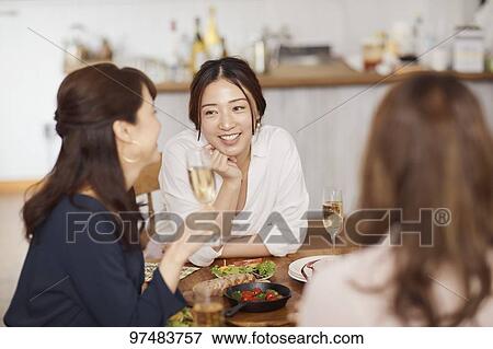 Japanese women having home party View Large Photo Image Stock Photo - Japanese women having home party. Fotosearch