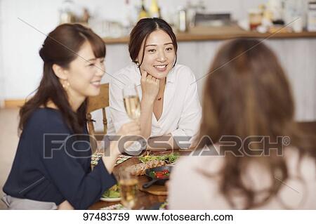 Japanese women having home party View Large Photo Image Stock Photo - Japanese women having home party. Fotosearch