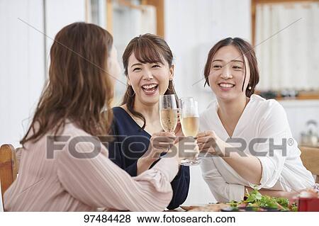 Japanese women having home party View Large Photo Image Stock Photo - Japanese women having home party. Fotosearch