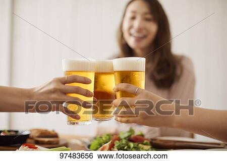 Stock Photograph - Japanese women having home party. Fotosearch