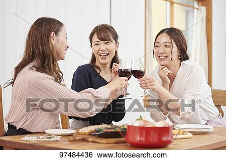 Japanese women having home party View Large Photo Image Stock Photograph - Japanese women having home party. Fotosearch