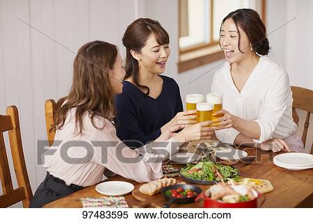 Japanese women having home party View Large Photo Image Stock Photography - Japanese women having home party. Fotosearch