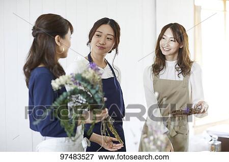 Japanese women with flowers View Large Photo Image Stock Photo - Japanese women with flowers. Fotosearch