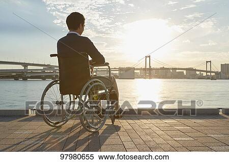 Japanese young man on wheelchair View Large Photo Image Stock Photography - Japanese young man on wheelchair. Fotosearch