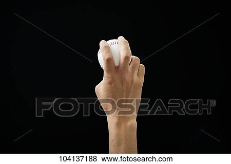 Male hand holding baseball ball View Large Photo Image Stock Photo - Male hand holding baseball ball. Fotosearch