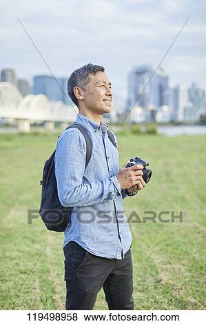 Mature Japanese man downtown Osaka, Japan View Large Photo Image Stock Photo - Mature Japanese man downtown Osaka, Japan. Fotosearch