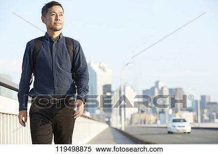 Mature Japanese man downtown Osaka, Japan View Large Photo Image Stock Photography - Mature Japanese man downtown Osaka, Japan. Fotosearch