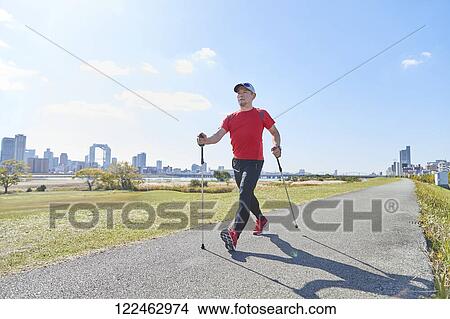 Mature Japanese man training downtown View Large Photo Image Picture - Mature Japanese man training downtown. Fotosearch