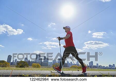 Mature Japanese man training downtown View Large Photo Image Picture - Mature Japanese man training downtown. Fotosearch