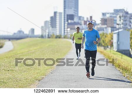 Mature Japanese man training downtown View Large Photo Image Stock Image - Mature Japanese man training downtown. Fotosearch