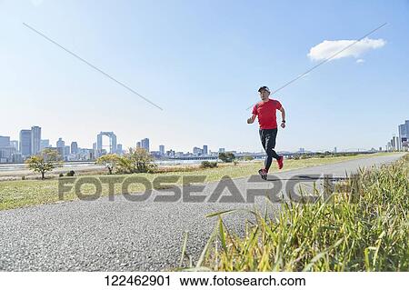 Mature Japanese man training downtown View Large Photo Image Stock Image - Mature Japanese man training downtown. Fotosearch