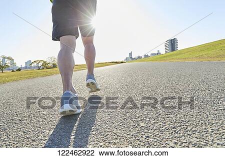 Mature Japanese man training downtown View Large Photo Image Stock Image - Mature Japanese man training downtown. Fotosearch