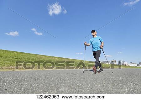 Mature Japanese man training downtown View Large Photo Image Stock Image - Mature Japanese man training downtown. Fotosearch