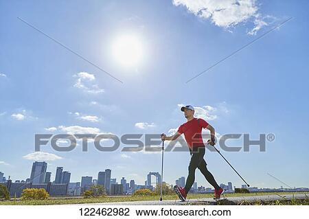Mature Japanese man training downtown View Large Photo Image Stock Image - Mature Japanese man training downtown. Fotosearch