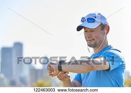 Mature Japanese man training downtown View Large Photo Image Stock Image - Mature Japanese man training downtown. Fotosearch