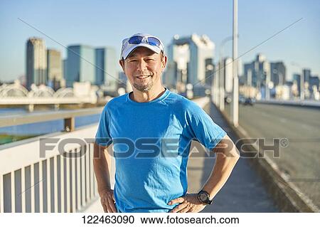 Mature Japanese man training downtown View Large Photo Image Stock Image - Mature Japanese man training downtown. Fotosearch