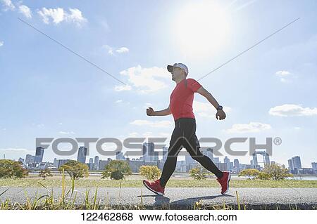 Mature Japanese man training downtown View Large Photo Image Stock Photo - Mature Japanese man training downtown. Fotosearch