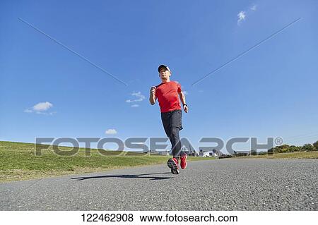 Mature Japanese man training downtown View Large Photo Image Stock Photo - Mature Japanese man training downtown. Fotosearch