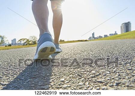Mature Japanese man training downtown View Large Photo Image Stock Photo - Mature Japanese man training downtown. Fotosearch