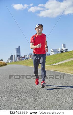 Mature Japanese man training downtown View Large Photo Image Stock Photo - Mature Japanese man training downtown. Fotosearch