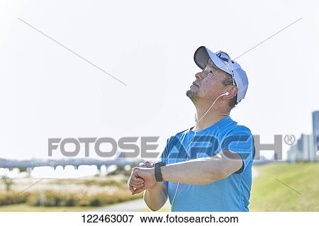 Mature Japanese man training downtown View Large Photo Image Stock Photo - Mature Japanese man training downtown. Fotosearch