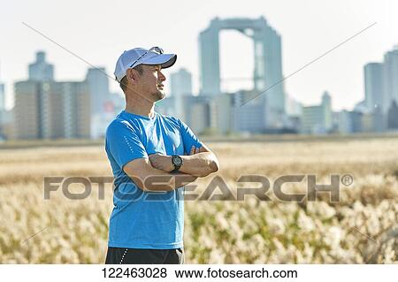 Mature Japanese man training downtown View Large Photo Image Stock Photo - Mature Japanese man training downtown. Fotosearch