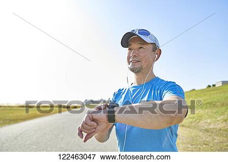 Mature Japanese man training downtown View Large Photo Image Stock Photo - Mature Japanese man training downtown. Fotosearch