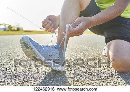 Mature Japanese man training downtown View Large Photo Image Stock Photograph - Mature Japanese man training downtown. Fotosearch
