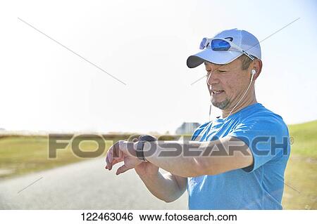 Mature Japanese man training downtown View Large Photo Image Stock Photograph - Mature Japanese man training downtown. Fotosearch