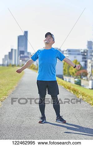 Mature Japanese man training downtown View Large Photo Image Stock Photography - Mature Japanese man training downtown. Fotosearch