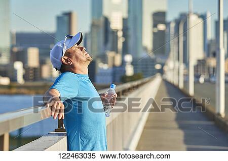 Mature Japanese man training downtown View Large Photo Image Stock Photography - Mature Japanese man training downtown. Fotosearch