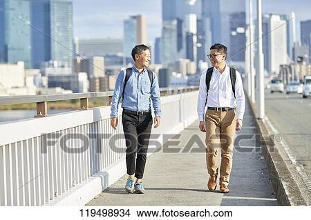 Mature Japanese men downtown Osaka, Japan View Large Photo Image Picture - Mature Japanese men downtown Osaka, Japan. Fotosearch