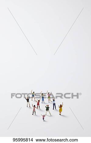 Miniature figures cheering View Large Photo Image Picture - Miniature figures cheering. Fotosearch