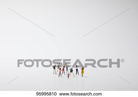 Miniature figures cheering View Large Photo Image Stock Image - Miniature figures cheering. Fotosearch