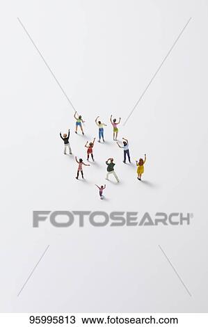Miniature figures cheering View Large Photo Image Stock Image - Miniature figures cheering. Fotosearch