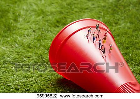 Miniature figures cheering View Large Photo Image Stock Image - Miniature figures cheering. Fotosearch