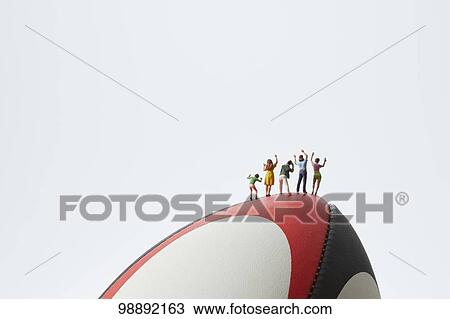 Miniatures and rugby ball View Large Photo Image Stock Image - Miniatures and rugby ball. Fotosearch