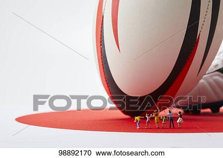 Miniatures and rugby ball View Large Photo Image Stock Image - Miniatures and rugby ball. Fotosearch