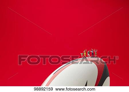Miniatures and rugby ball View Large Photo Image Stock Photo - Miniatures and rugby ball. Fotosearch
