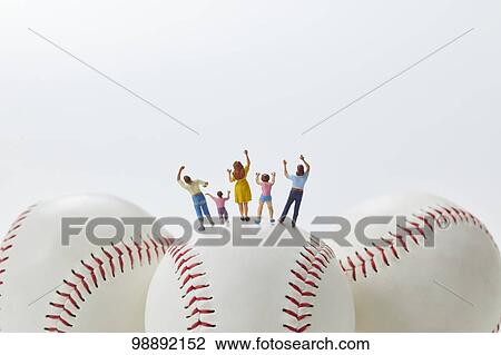 Miniatures on baseball View Large Photo Image Stock Image - Miniatures on baseball. Fotosearch