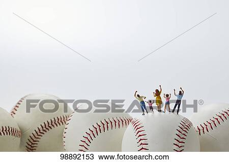 Miniatures on baseball View Large Photo Image Stock Image - Miniatures on baseball. Fotosearch
