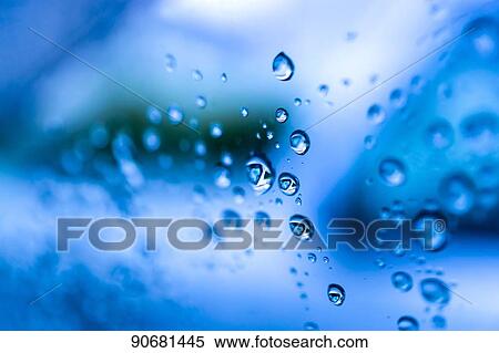 Raindrops on glass View Large Photo Image Stock Photography - Raindrops on glass. Fotosearch