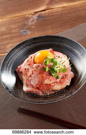 Picture - Roast beef rice bowl. Fotosearch