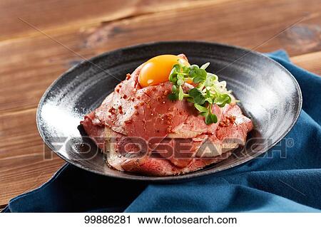 Stock Image - Roast beef rice bowl. Fotosearch
