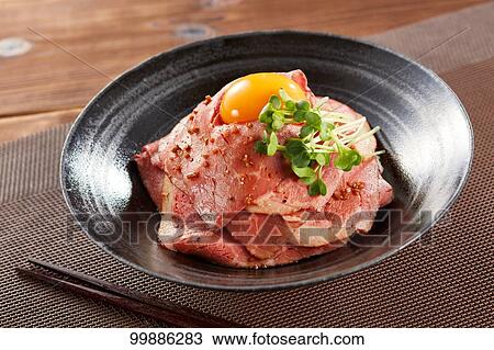 Stock Image - Roast beef rice bowl. Fotosearch