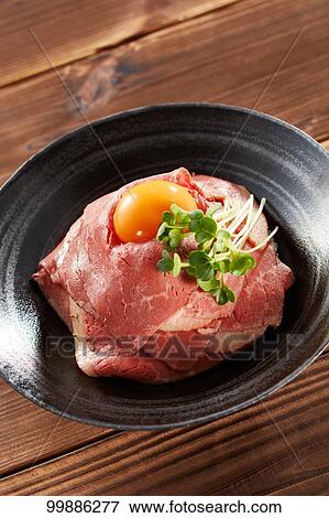 Stock Photo - Roast beef rice bowl. Fotosearch