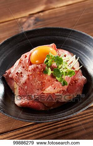 Stock Photo - Roast beef rice bowl. Fotosearch